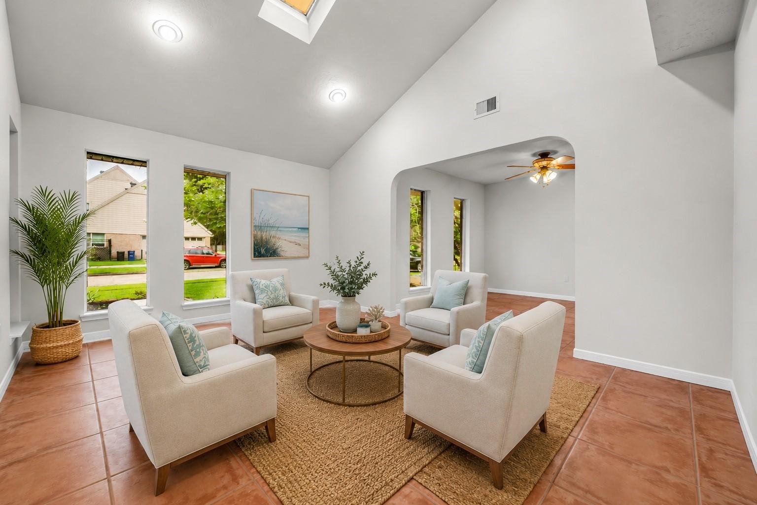 Image 2: Welcoming Sitting Room! Located just off the entry