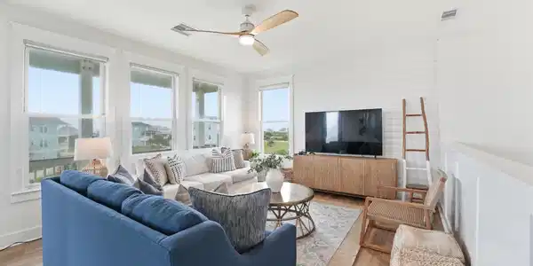 Image 2: Light filled living area with scenic views, coasta