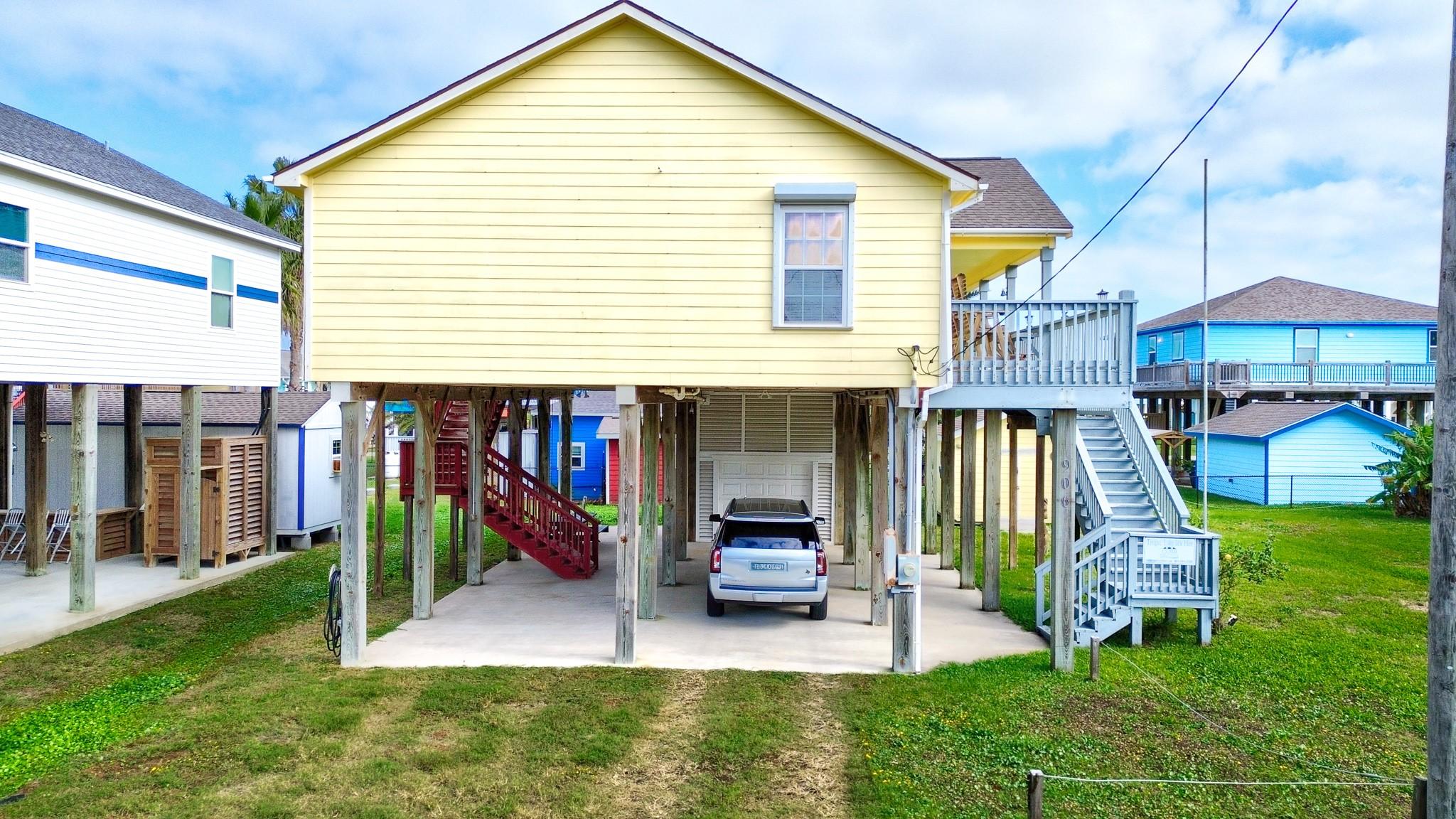 Image 3: Two staircases for front access to the deck and re