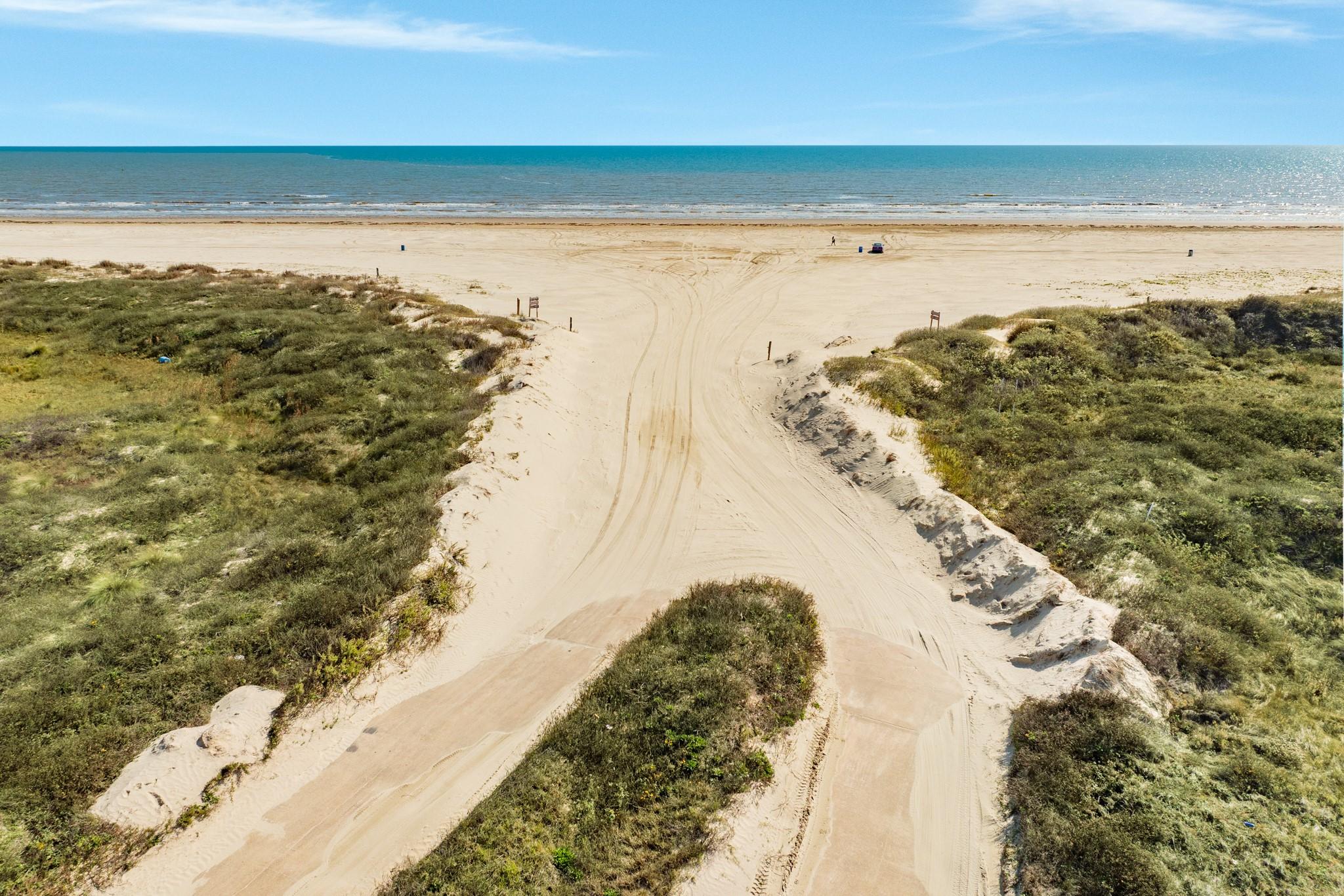Image 1: A quick stroll and this is your beach!