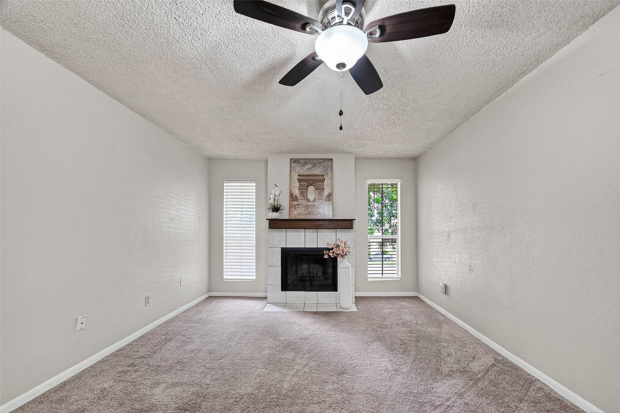 Image 1: Welcome home. Lots of light fills this large livin