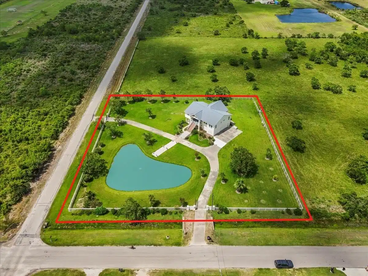 Image 1: 8.25 Acres behind red line.