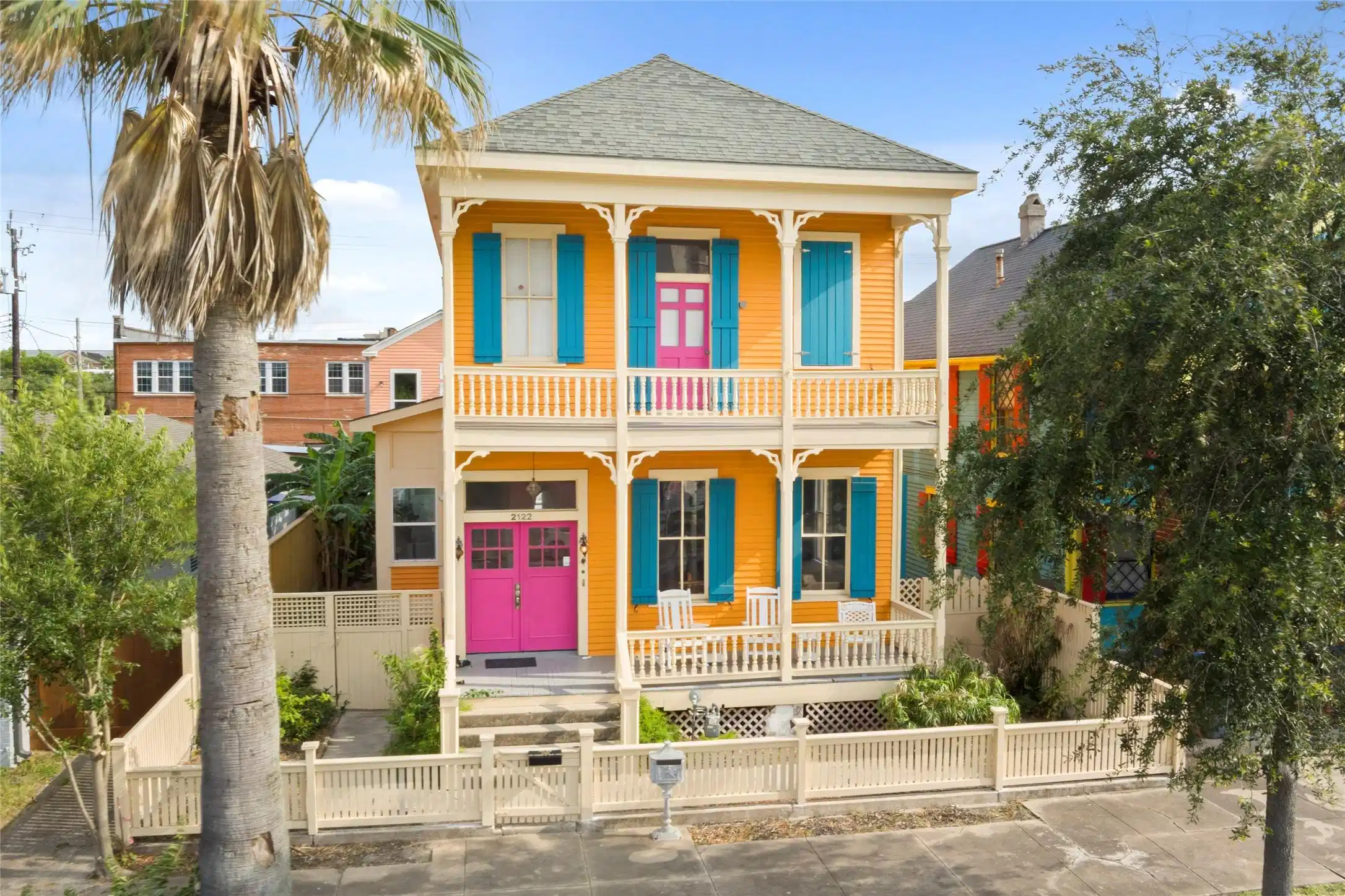 Image 1: This vibrant two-story Victorian home in the Histo