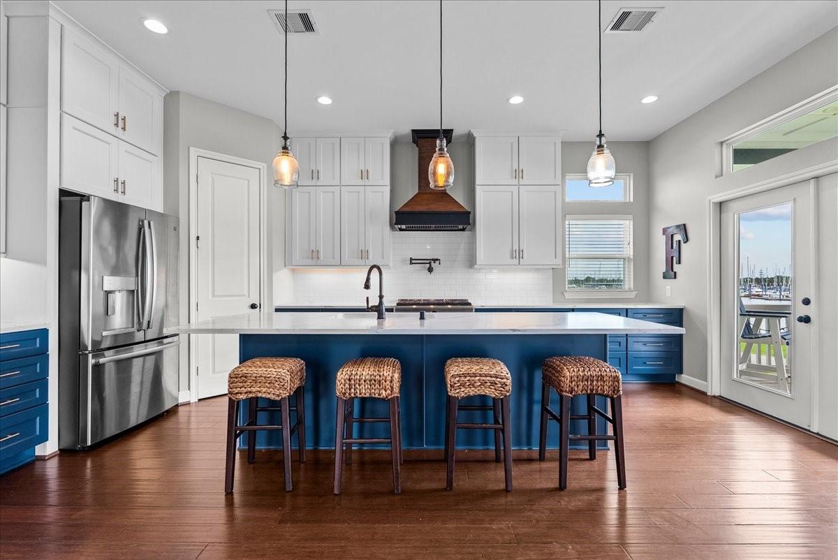 Image 4: Stunning island kitchen is the heart of the home,