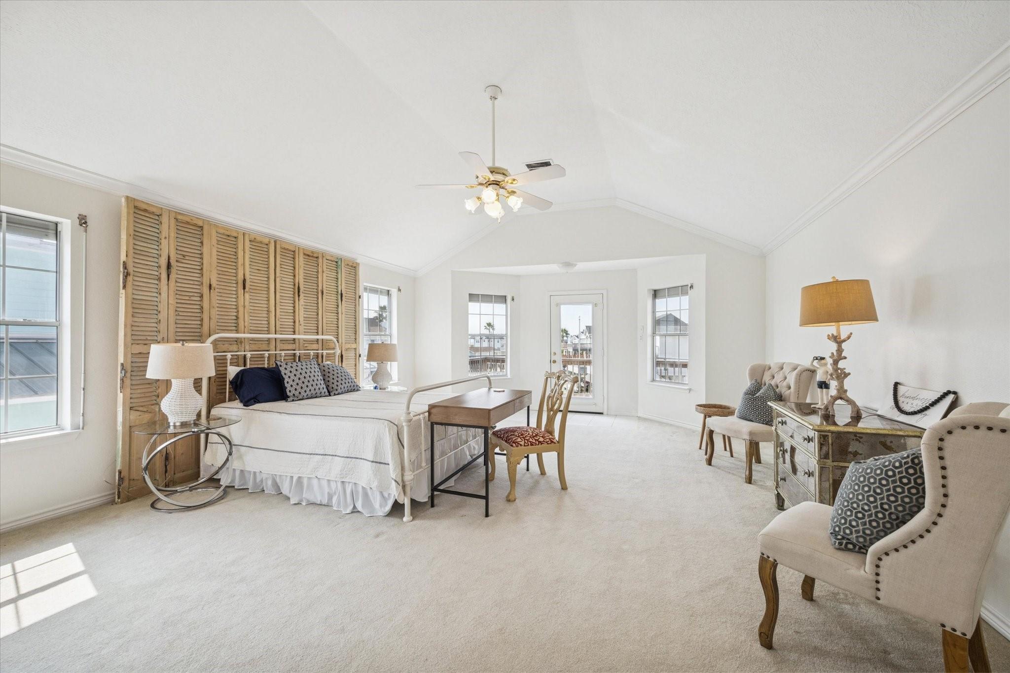 Image 4: This spacious and inviting primary bedroom boasts