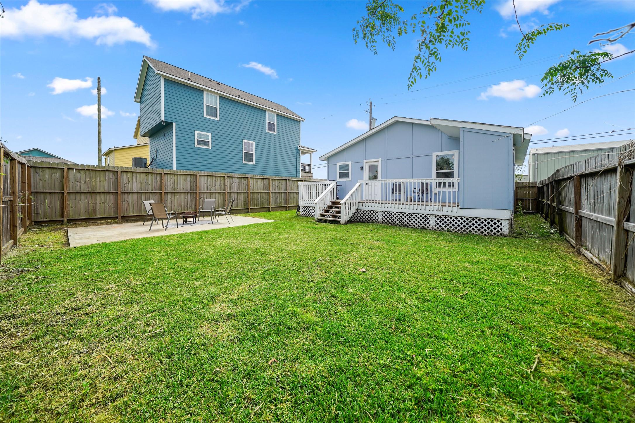 Image 3: Fully fenced backyard offering privacy and space t