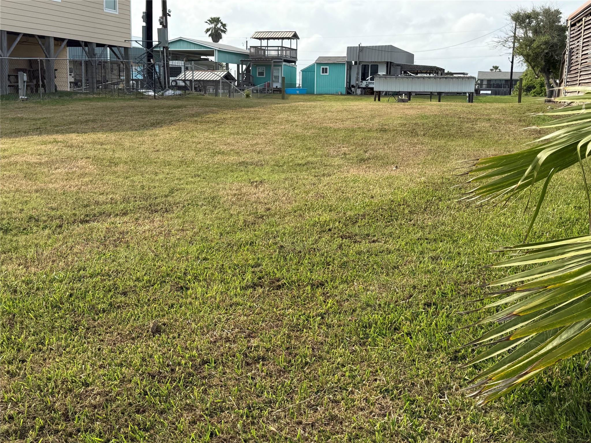 Image 4: Grassy high lot with utilities installed including