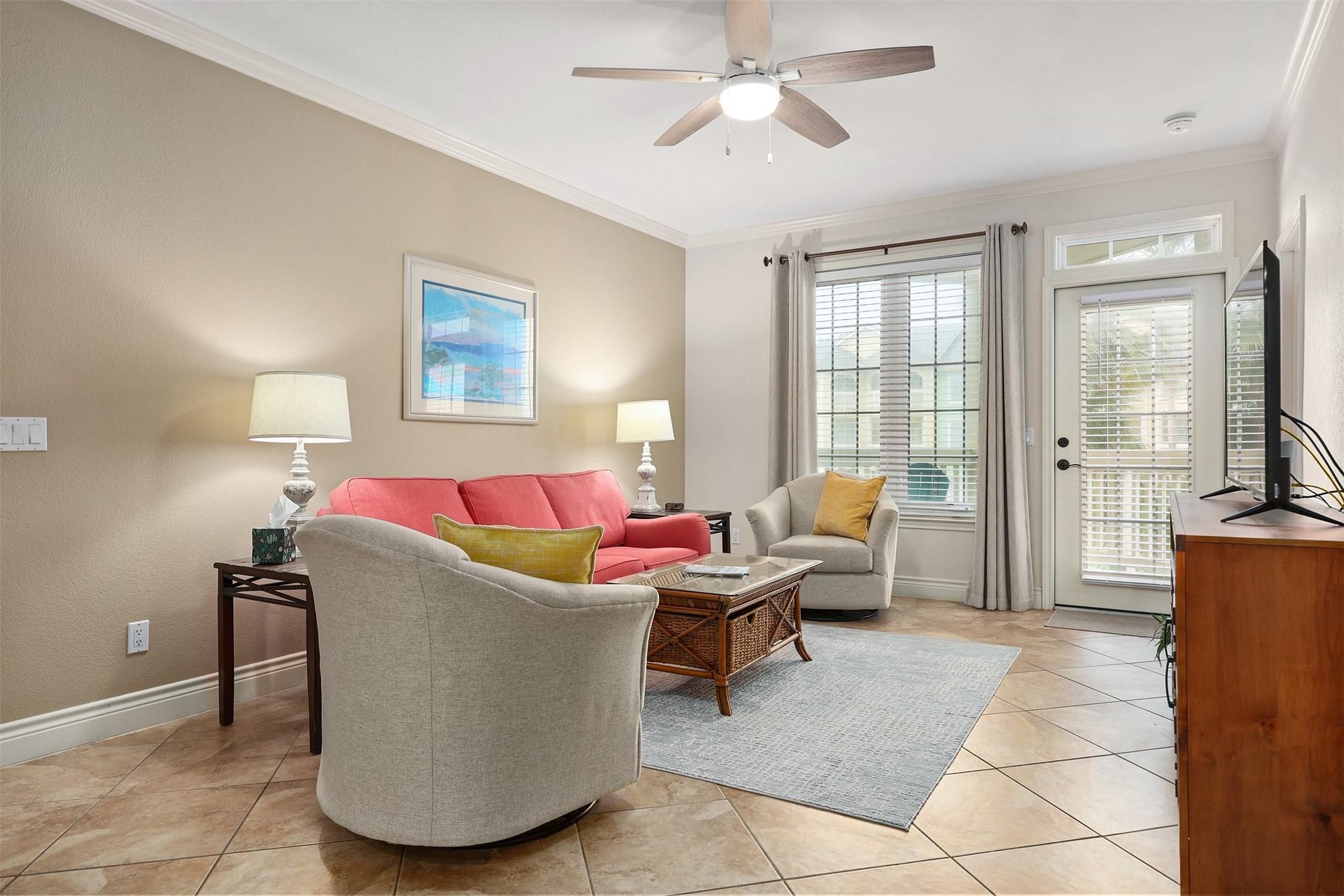 Image 2: This neutral-palette living space is bathed in nat