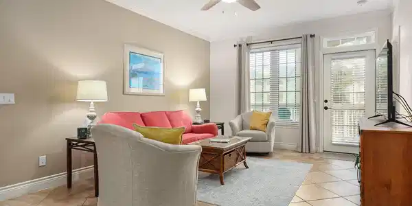 Image 2: This neutral-palette living space is bathed in nat