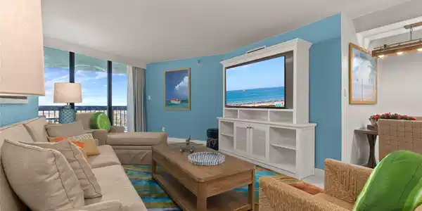 Image 3: This bright and inviting living room features a co