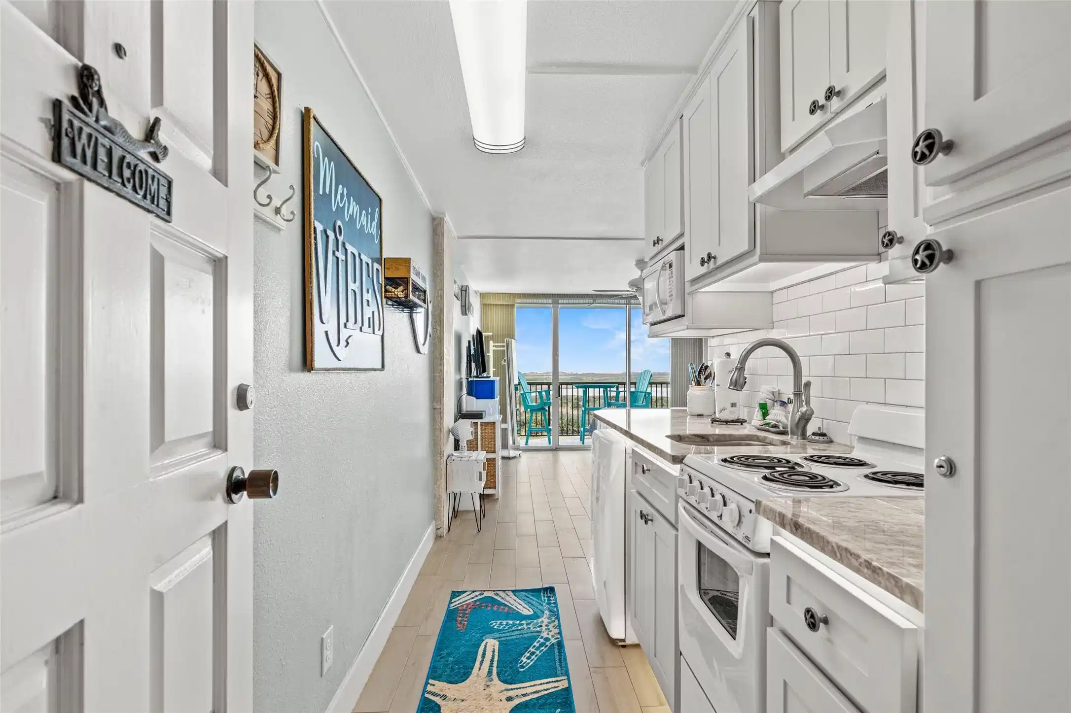 Image 1: Enter into a beautifully updated kitchen.