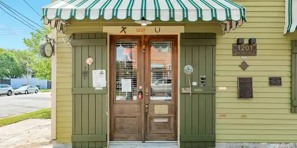 Image 3: Adorable property with great curb appeal.