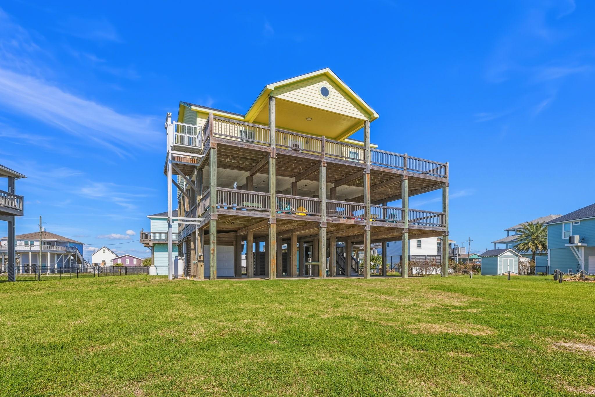 Image 3: The home comes equipped with a garage, lift, outdo