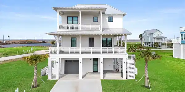 Image 2: Welcome to Sweetwater Cove with this elevated coas