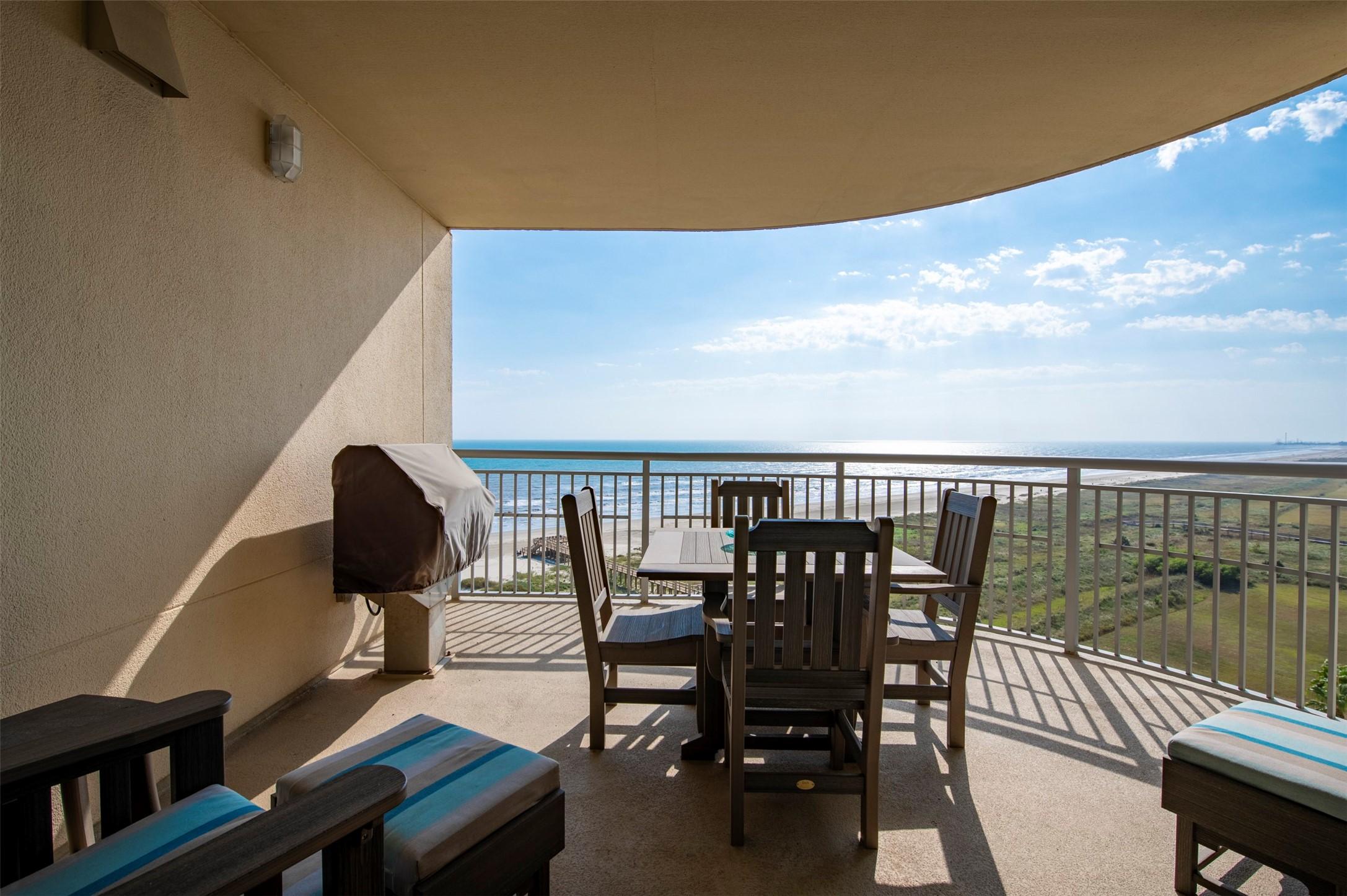 Image 2: Spacious beachfront balcony has plenty of room for