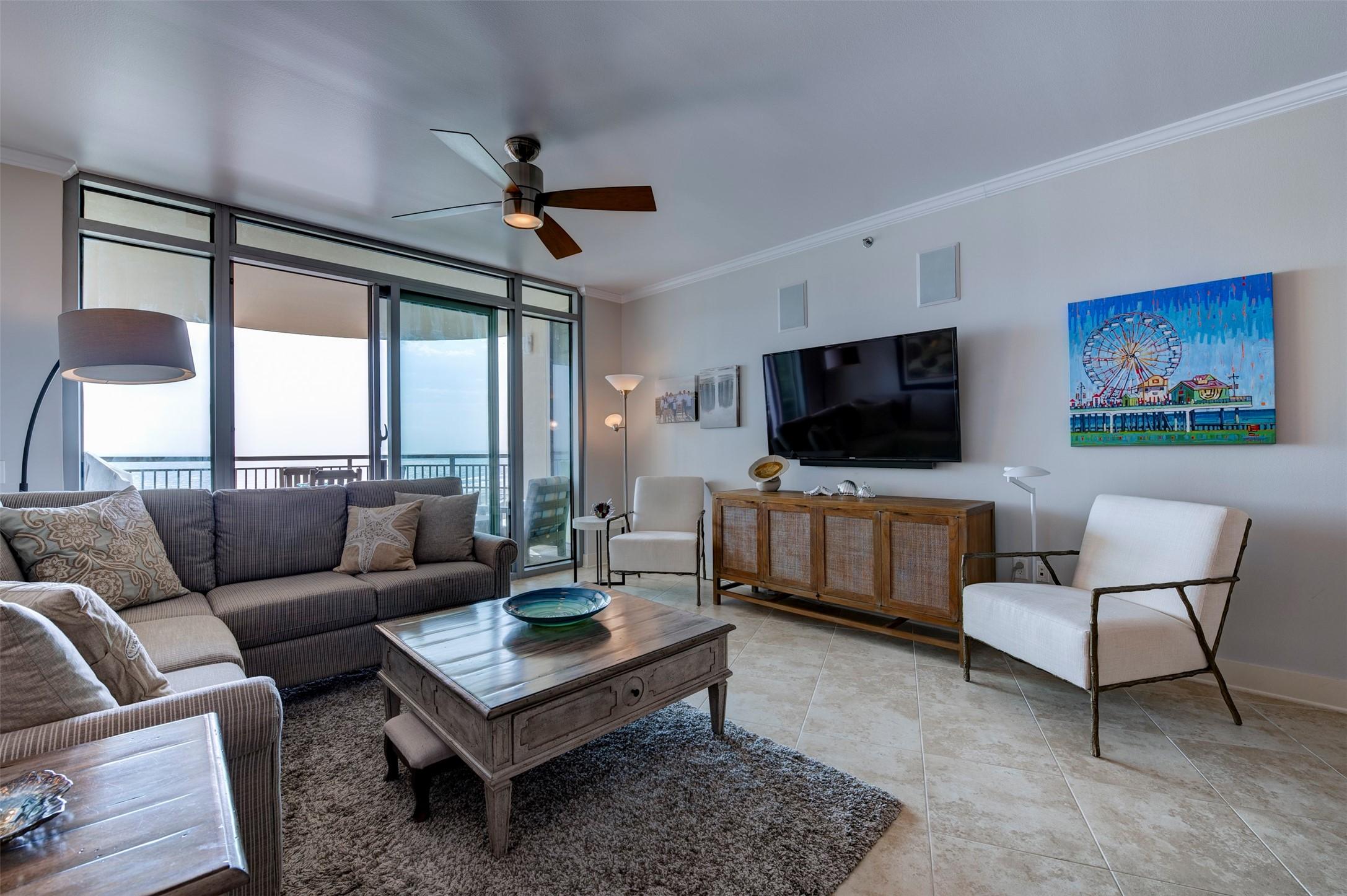 Image 3: Living Area features the fabulous views of the sa