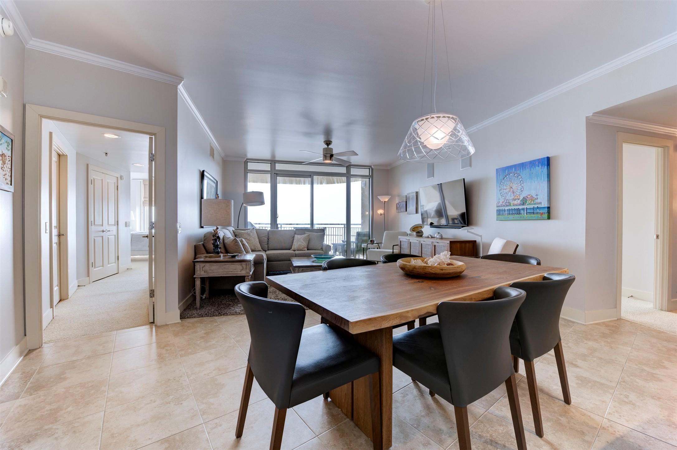 Image 4: An open floor plan is highlighted by views from al
