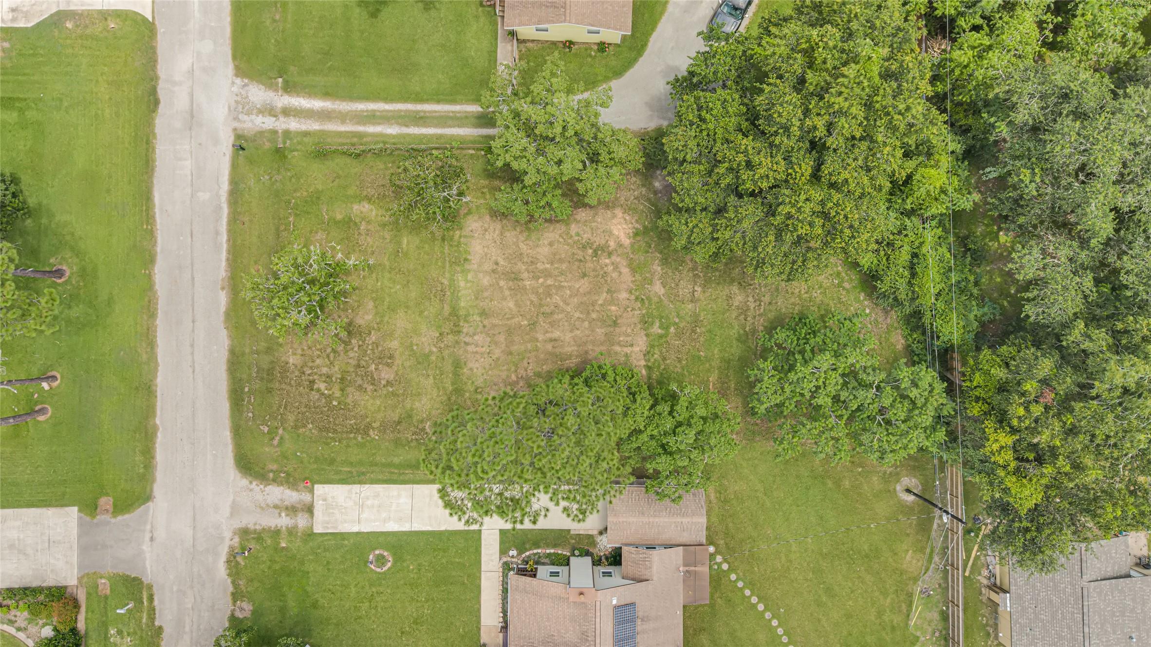 Image 2: Spacious vacant lot nestled in a tranquil neighbor
