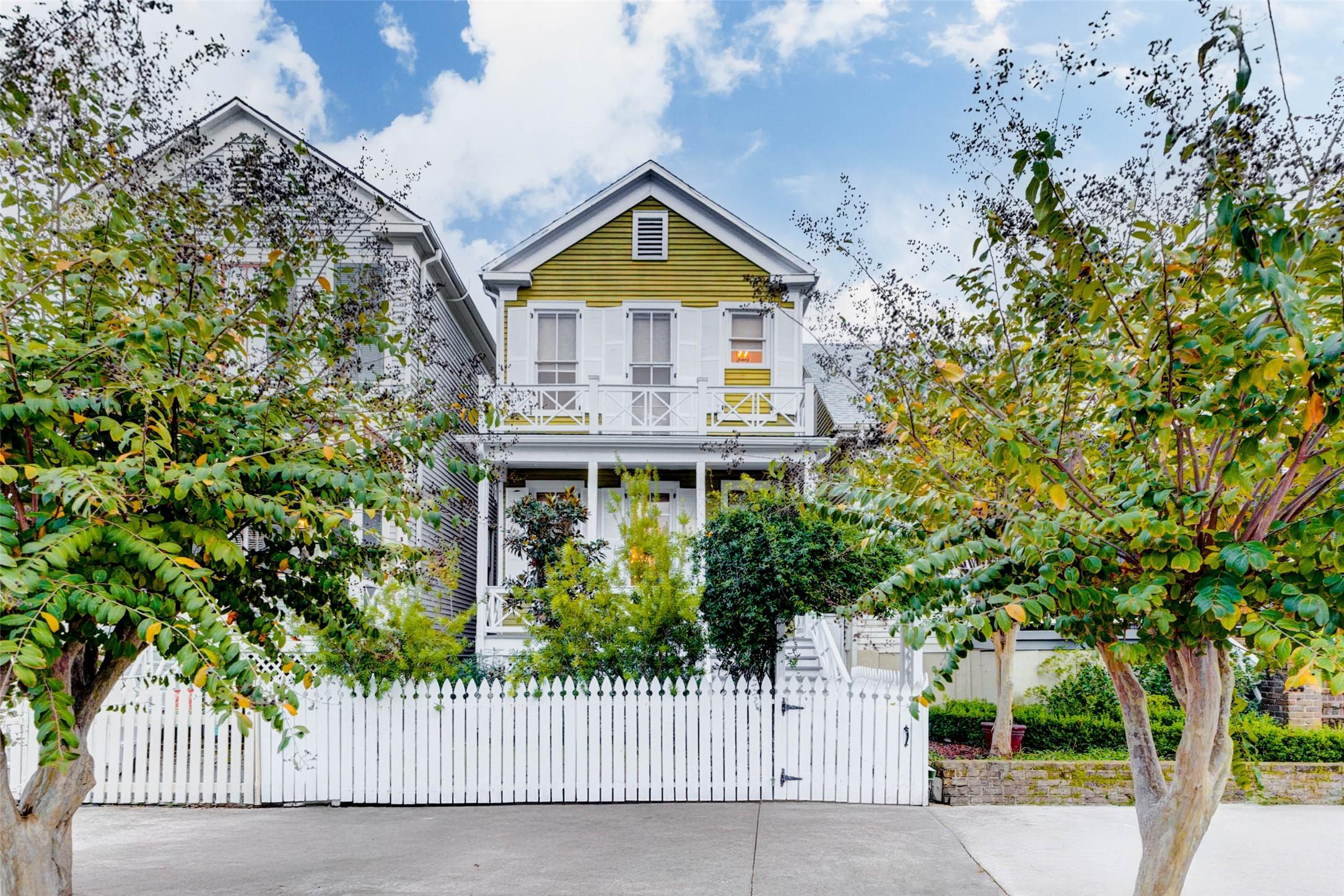 Image 3: Welcoming trees surround property