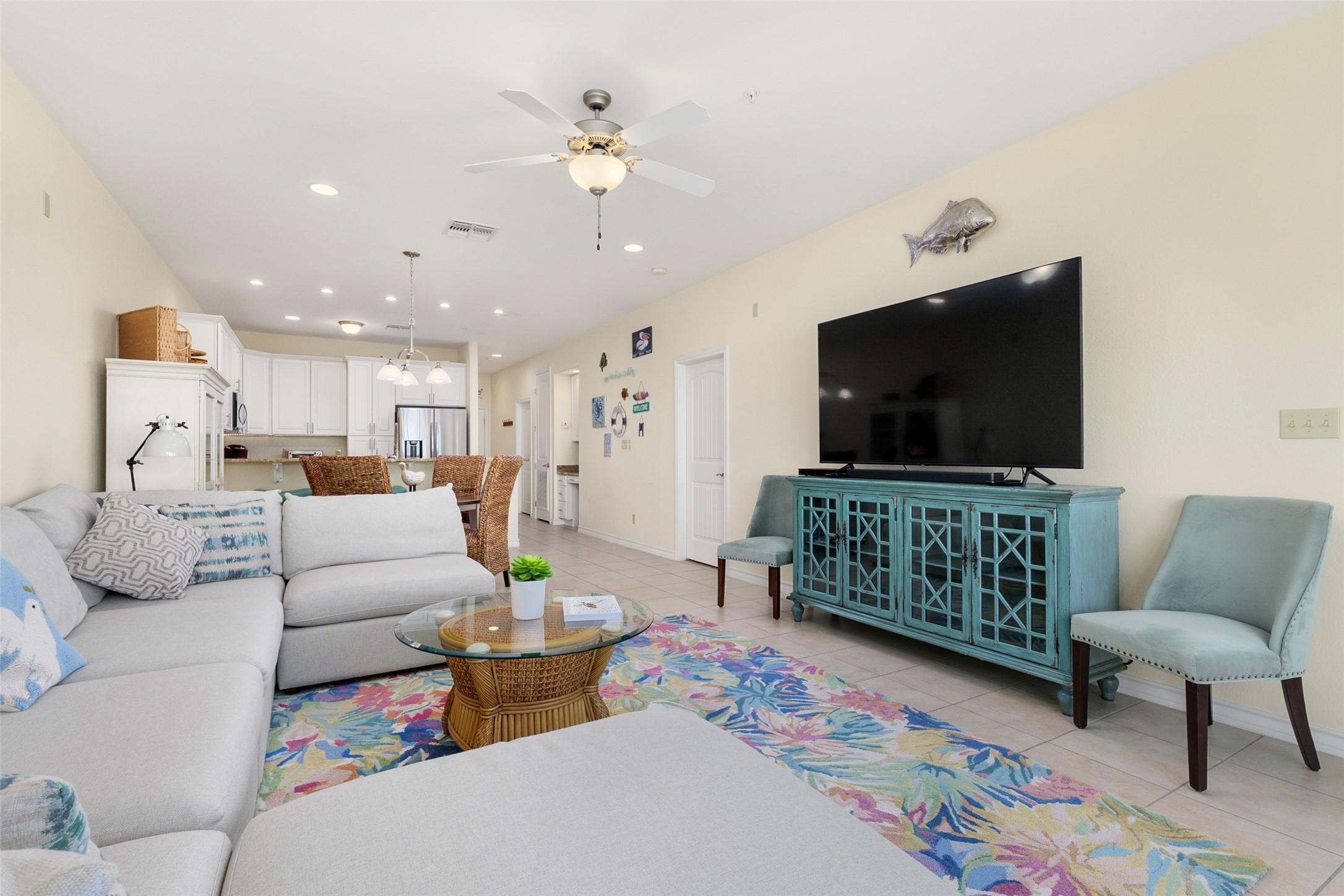 Image 2: Open concept, you can see the bay from the living