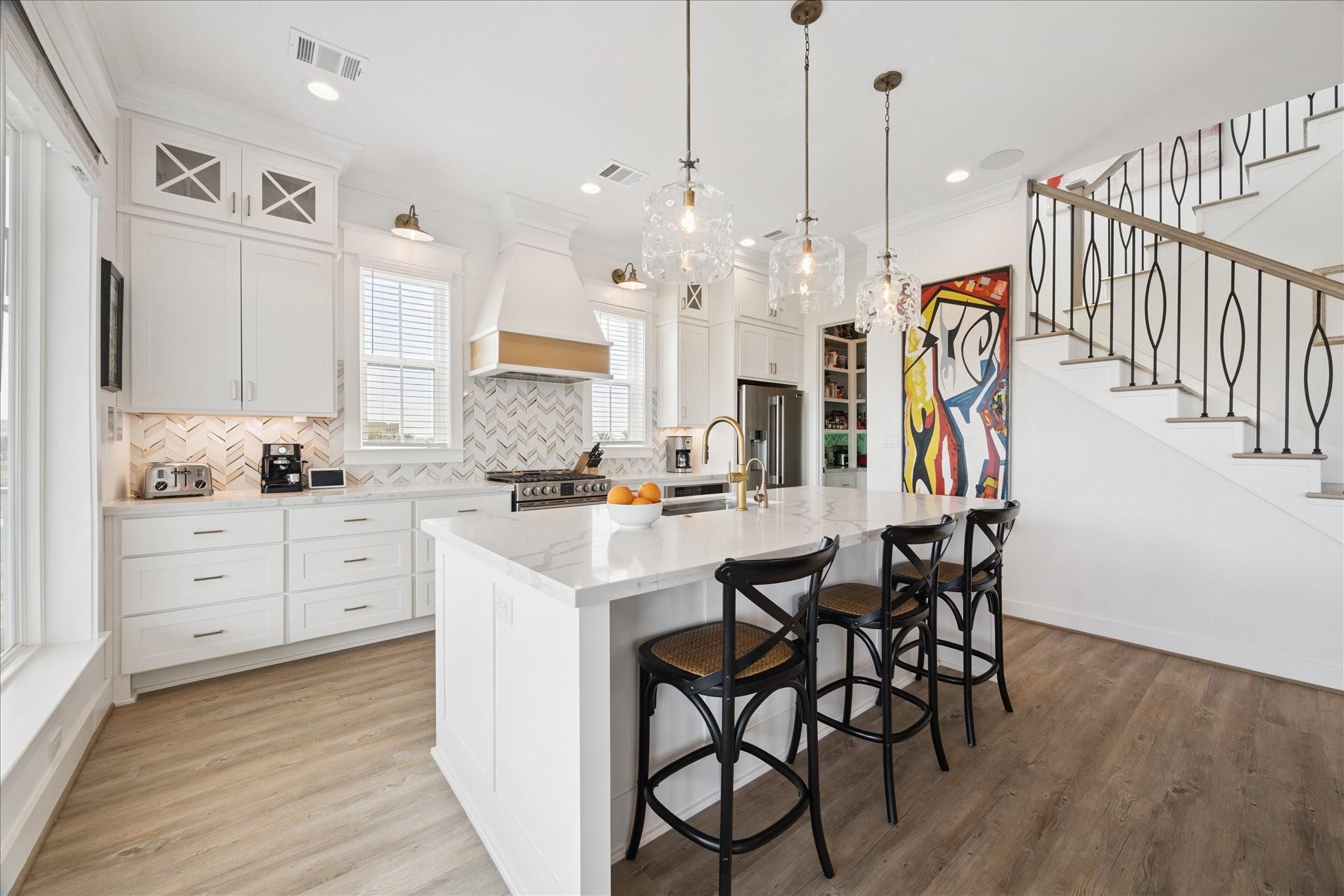Image 3: The chef&rsquo;s kitchen and walk-in pantry with custom