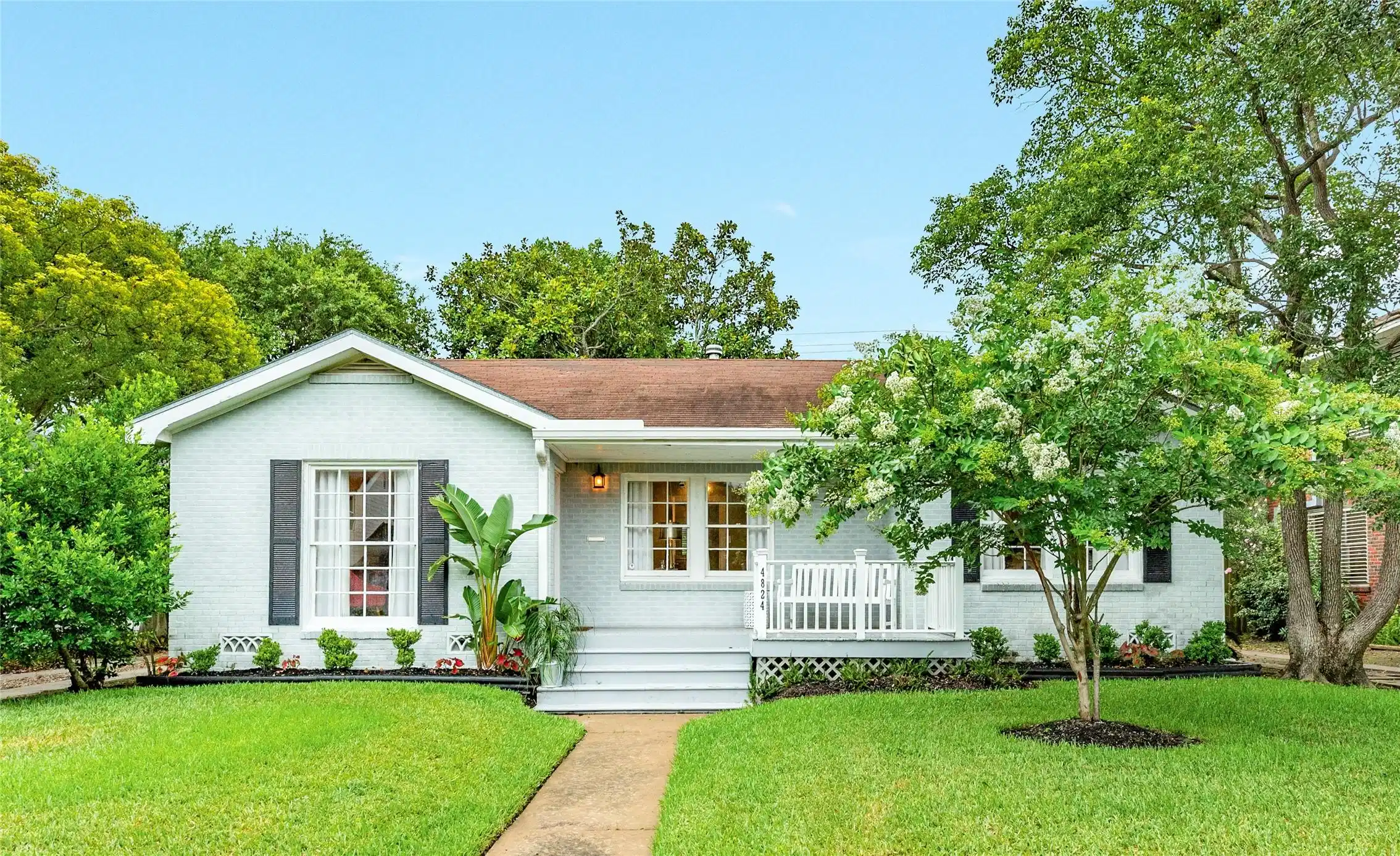 Image 1: Charming cottage with an inviting front porch
