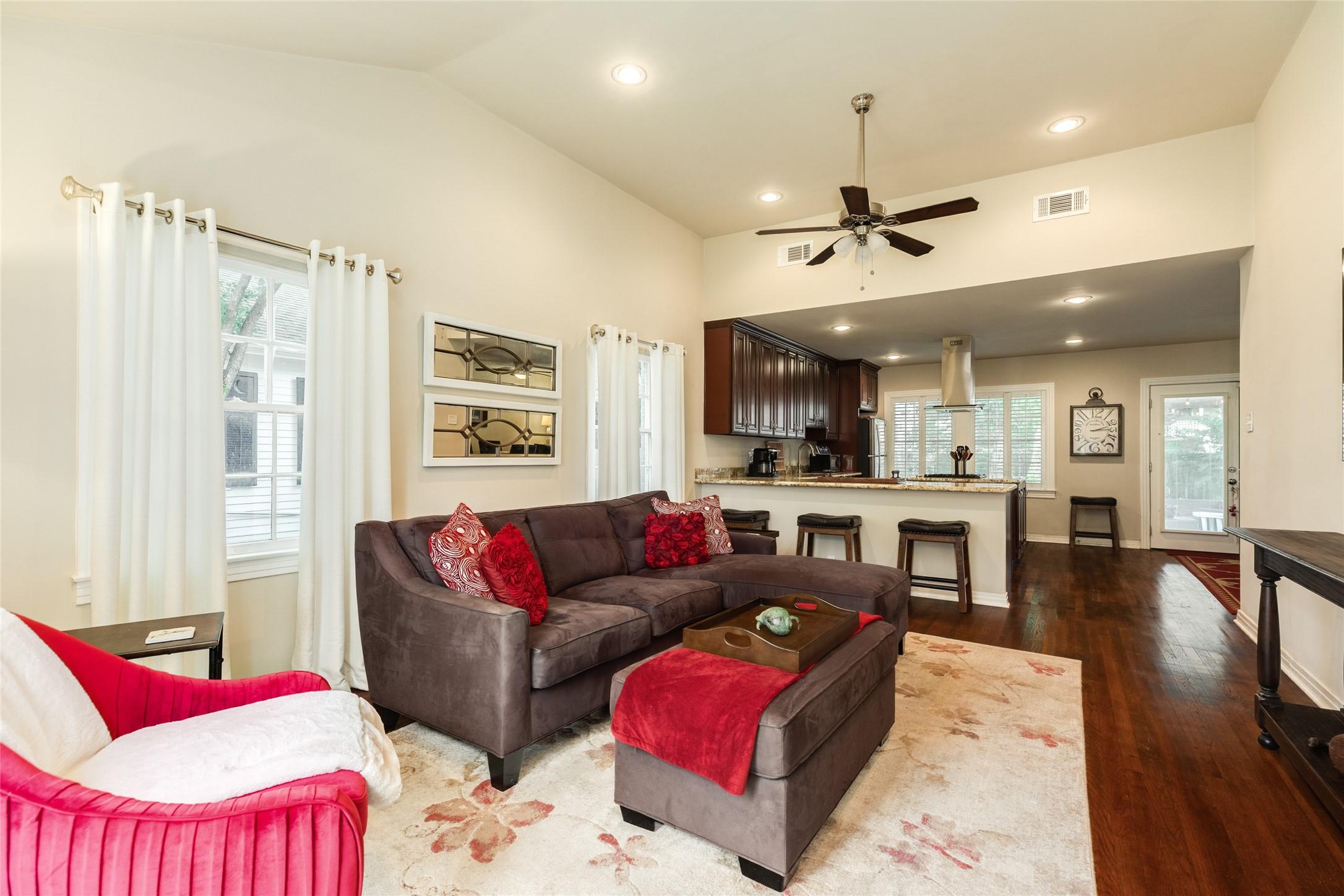 Image 4: Front living area upon entry to the home.  Hardwoo