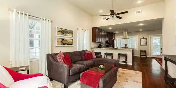 Image 4: Front living area upon entry to the home.  Hardwoo