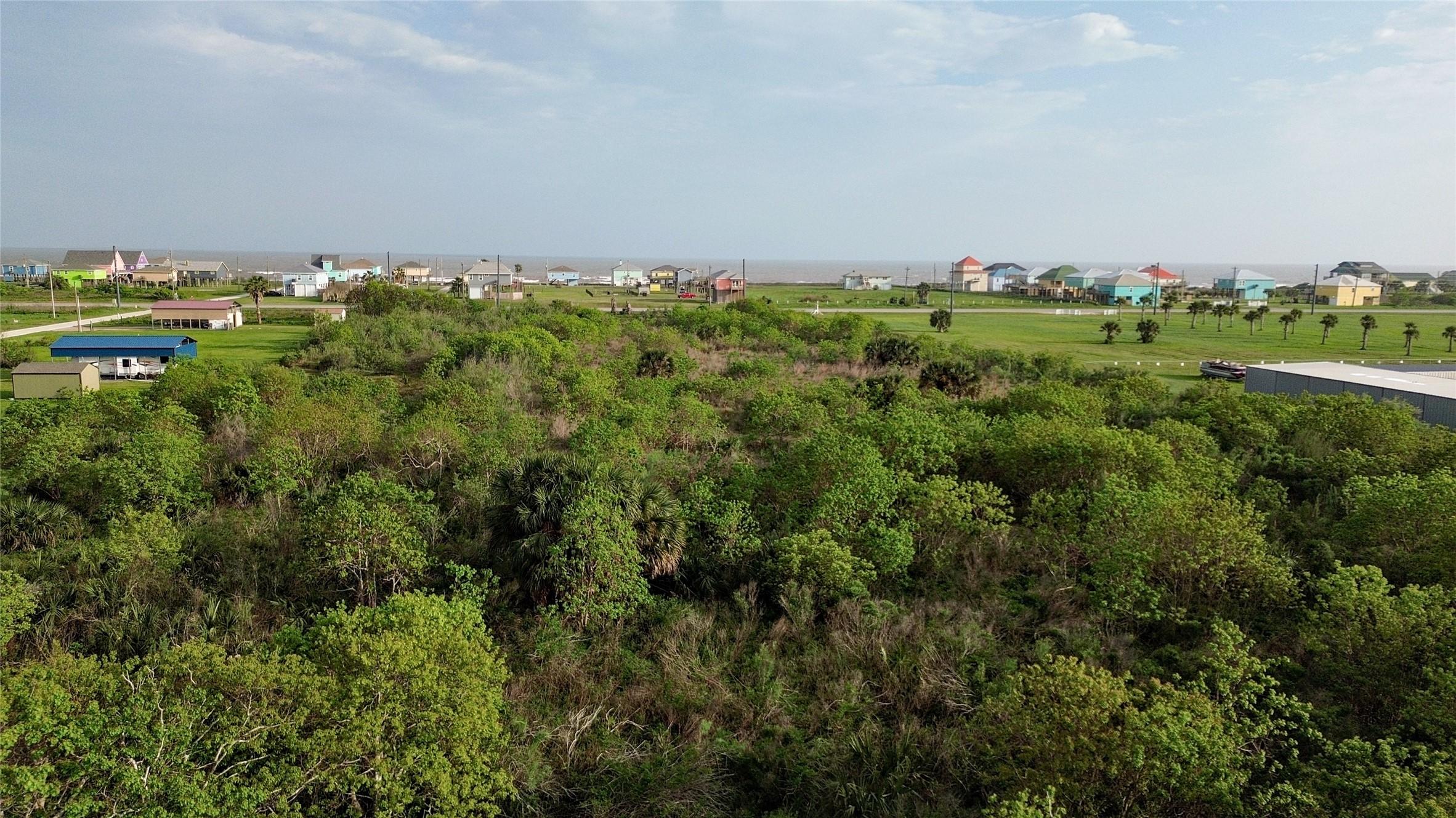 Image 1: View from the back of the lot to the beach. Beach