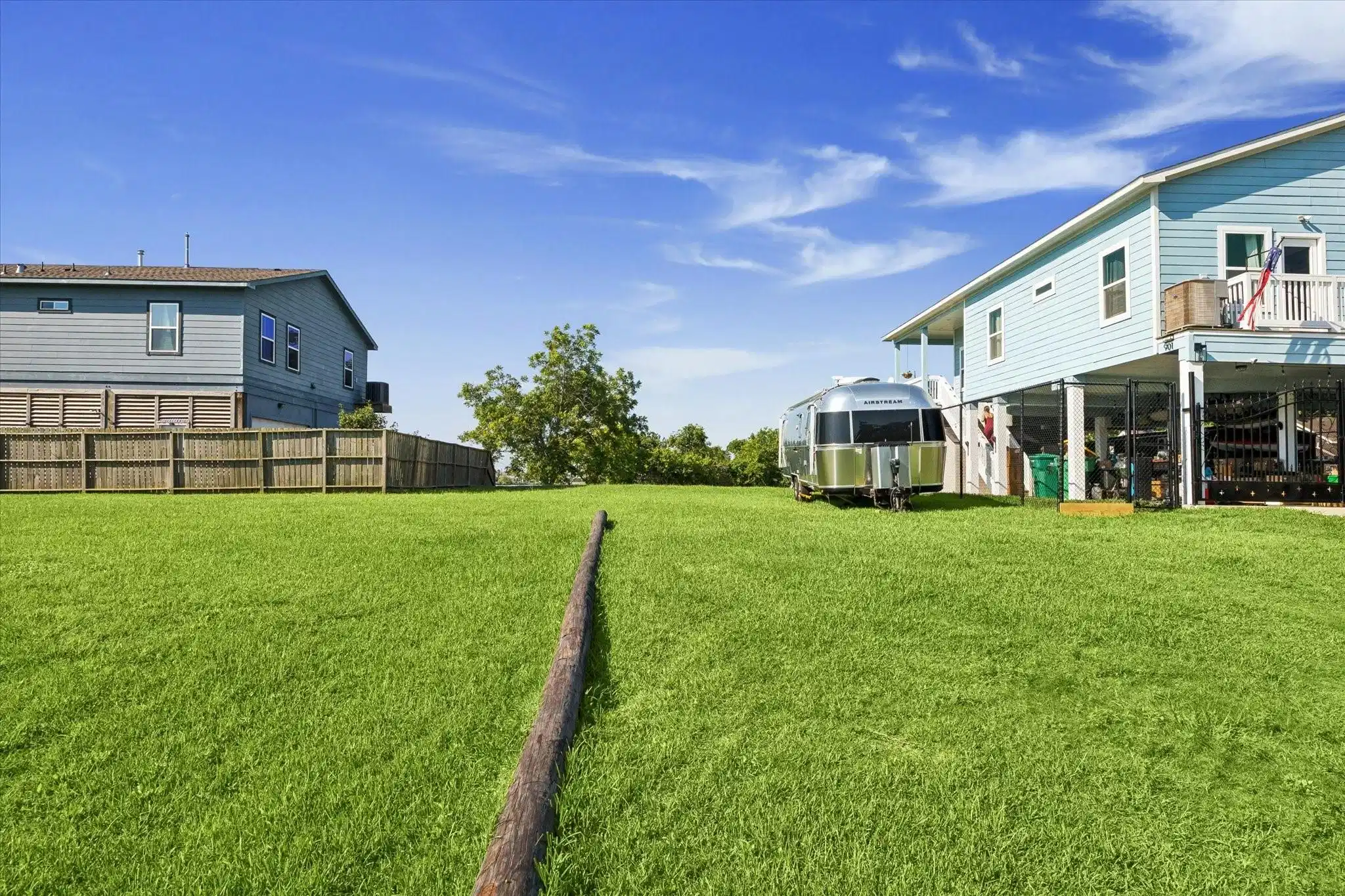 Image 1: Spacious lot with nature views from the front and