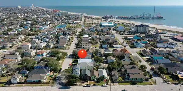Image 2: This aerial photo showcases a charming coastal nei