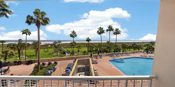 Image 3: Relaxing in the 70K Heated Pool after Beach Trips