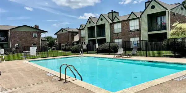 Image 3: Community pool located in front of the condo.