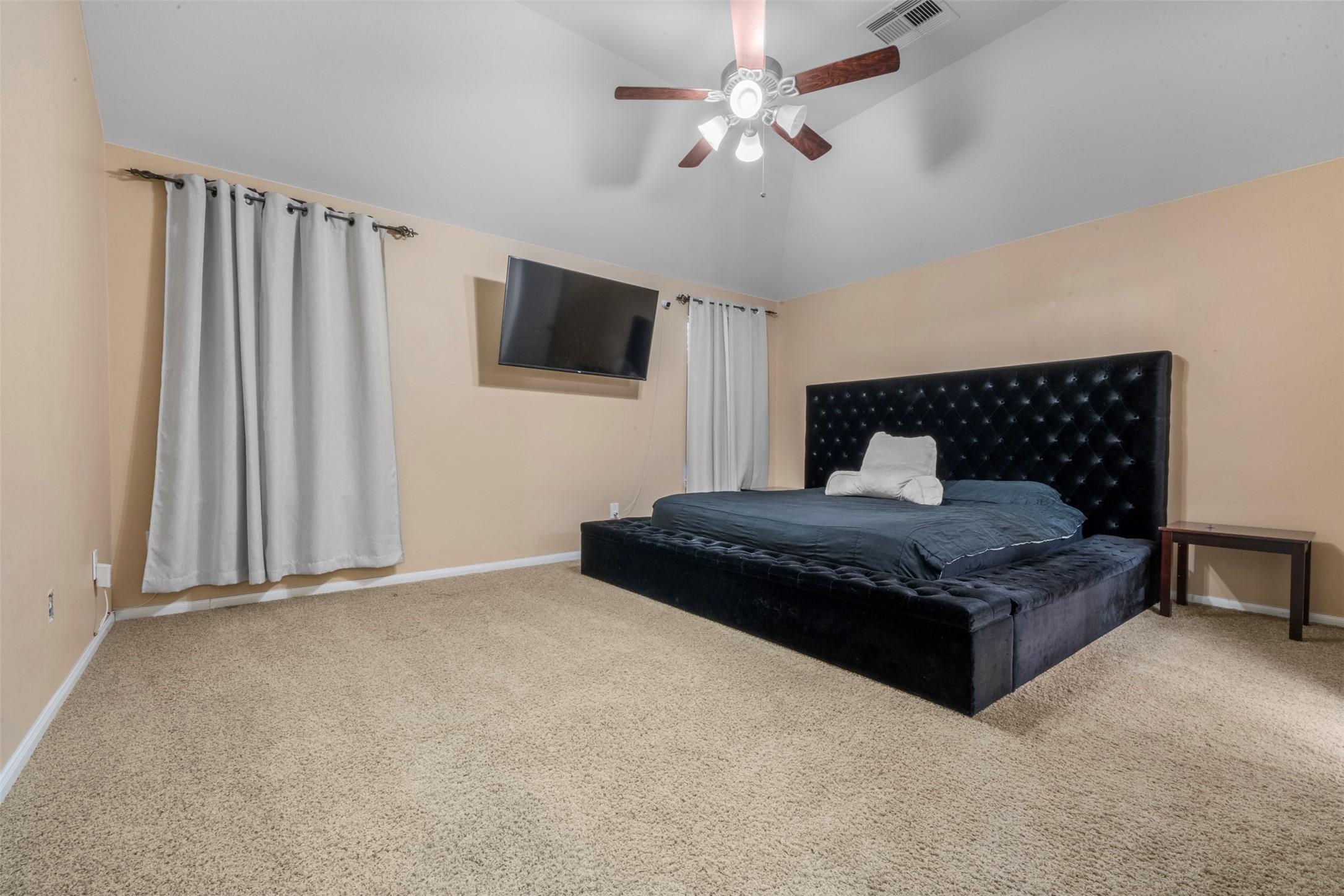 Image 4: Spacious Primary bedroom.