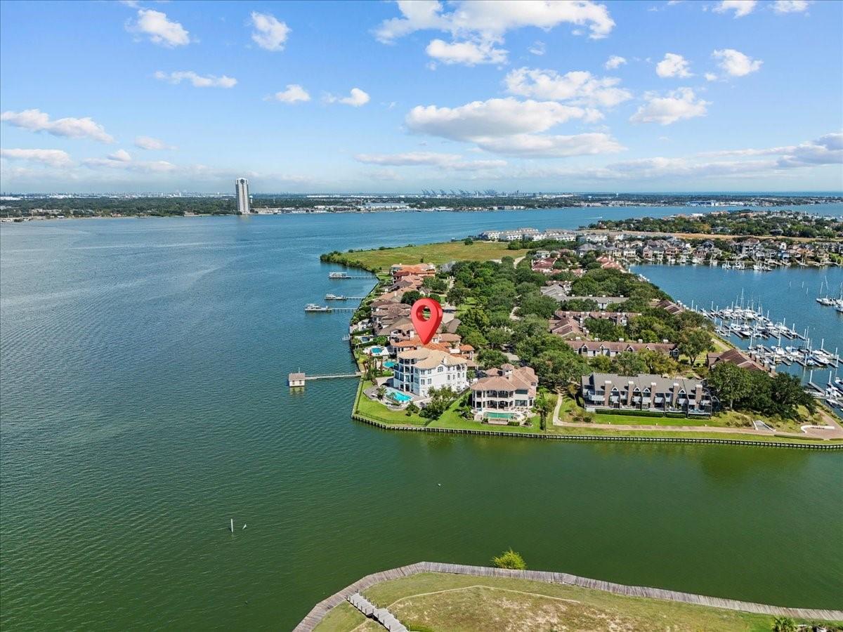 Image 4: Stunning waterfront view of the serene cove, perfe