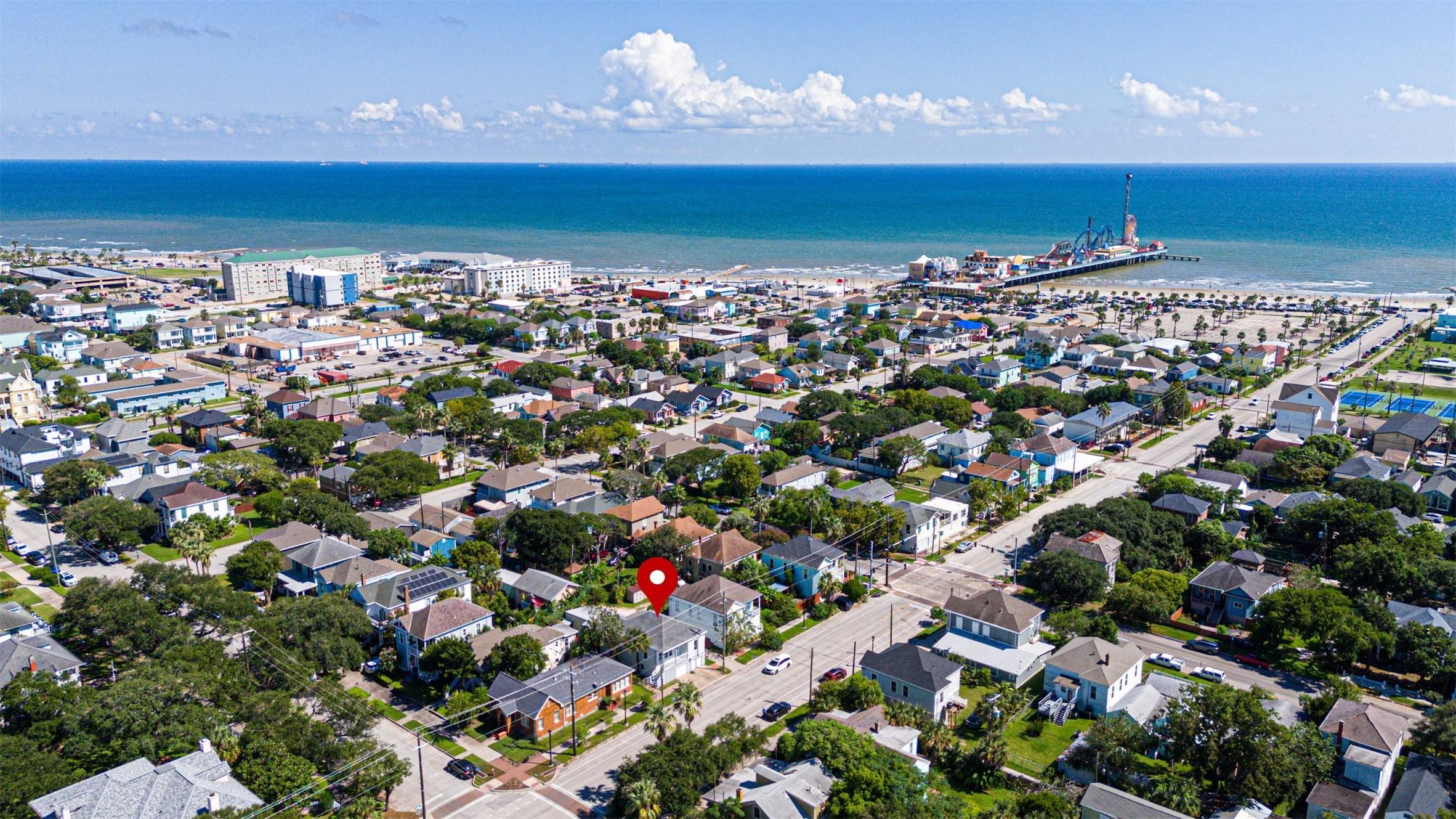 Image 2: This aerial view highlights the property's prime l