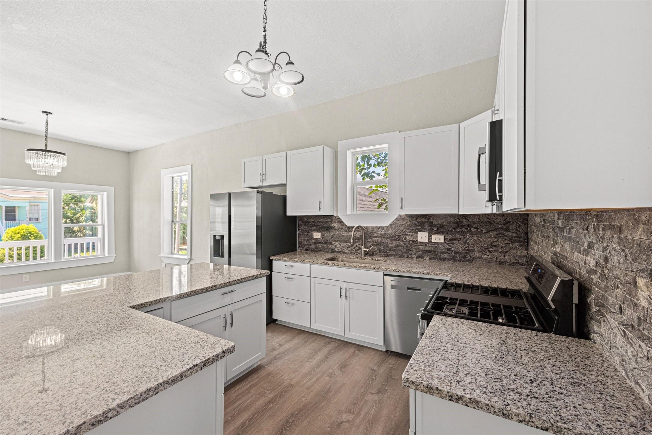 Image 3: At the heart of the home, the beautifully renovate