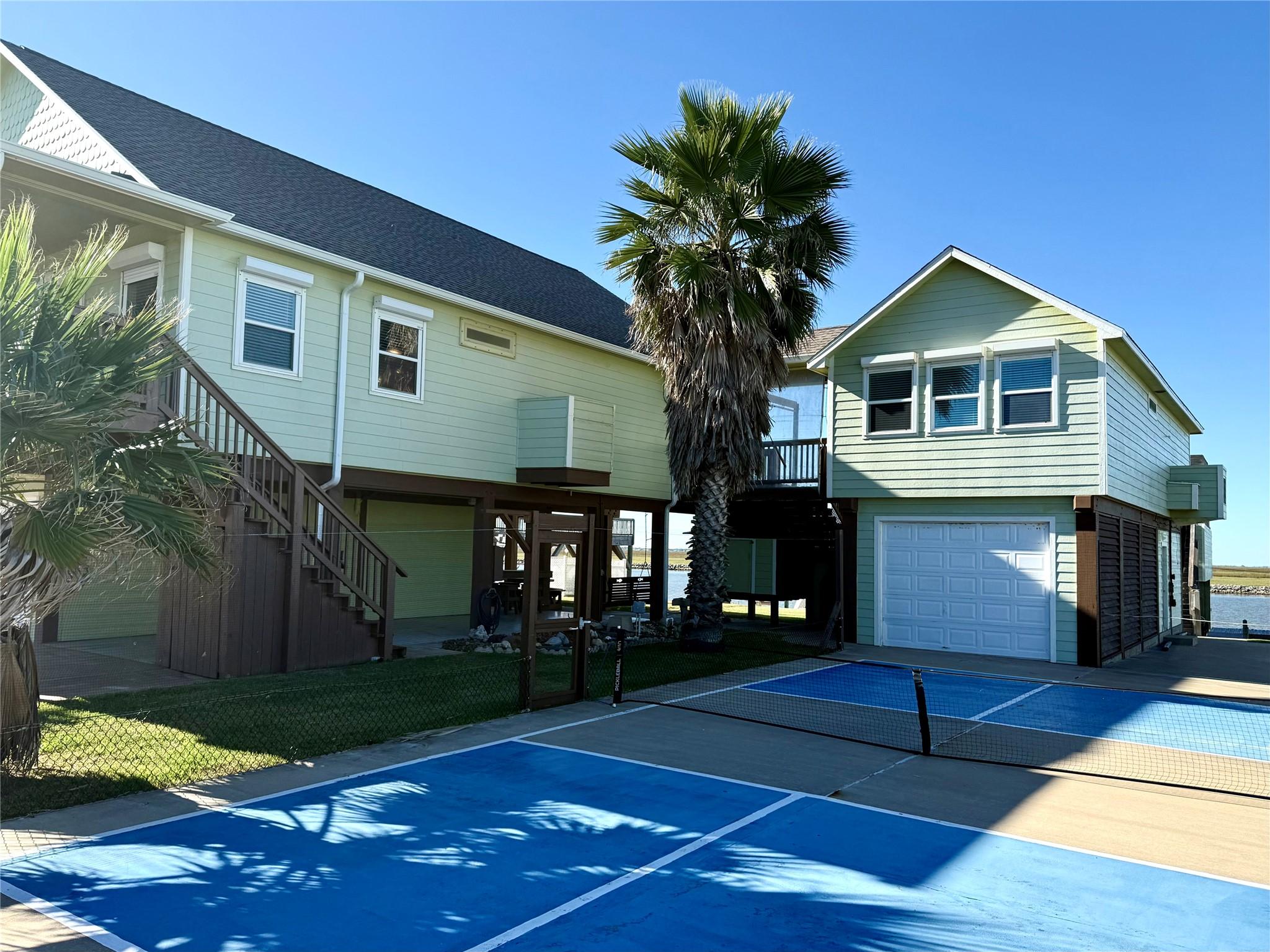 Image 1: Discover this unique haven with a fabulous main ho