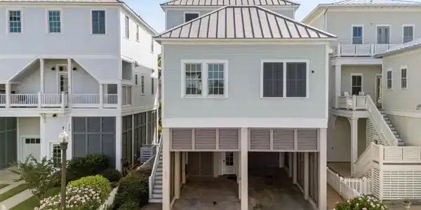Image 2: This charming home offers ample parking for multip