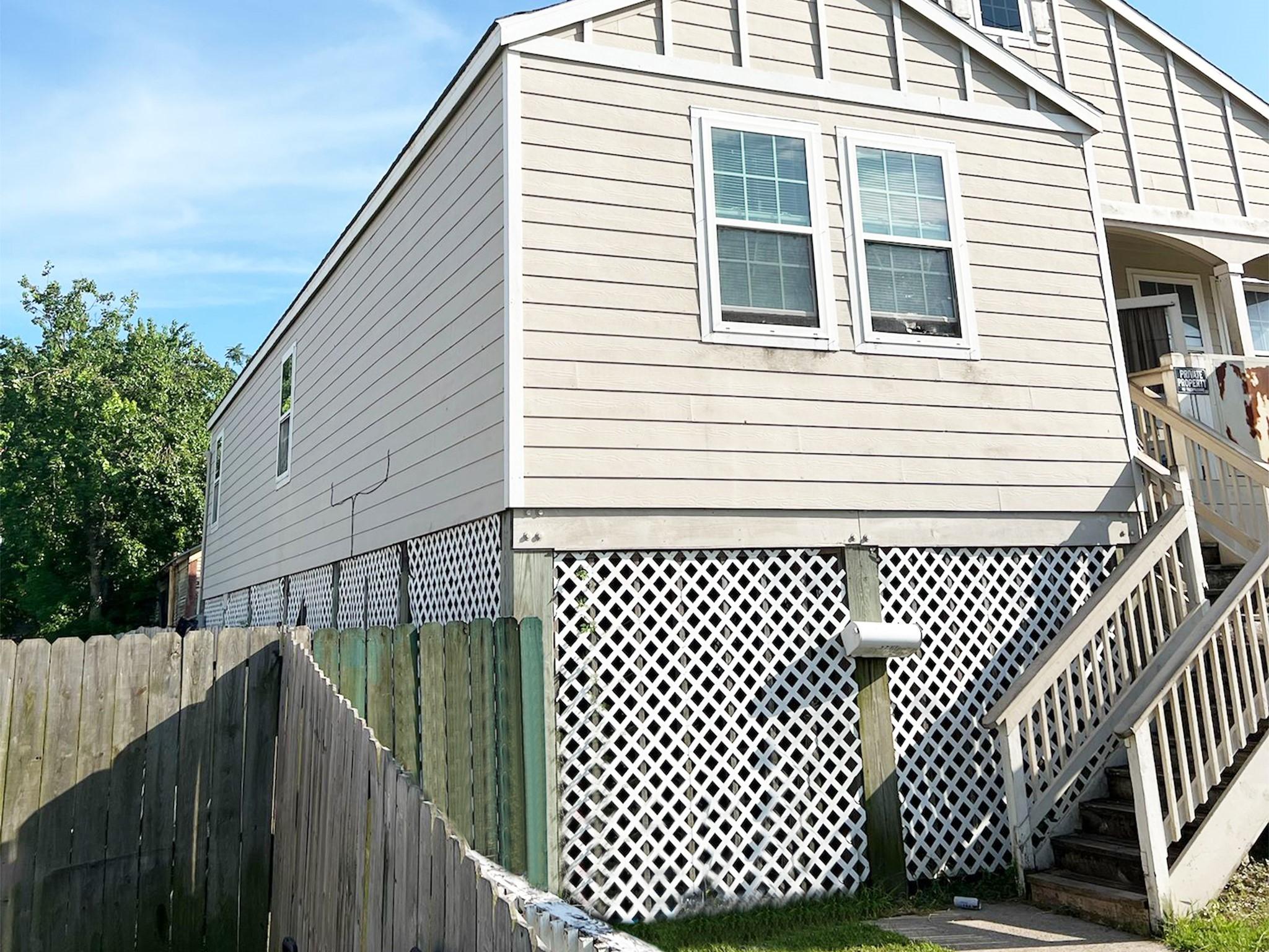 Image 4: Elevated coastal retreat with off-street parking a