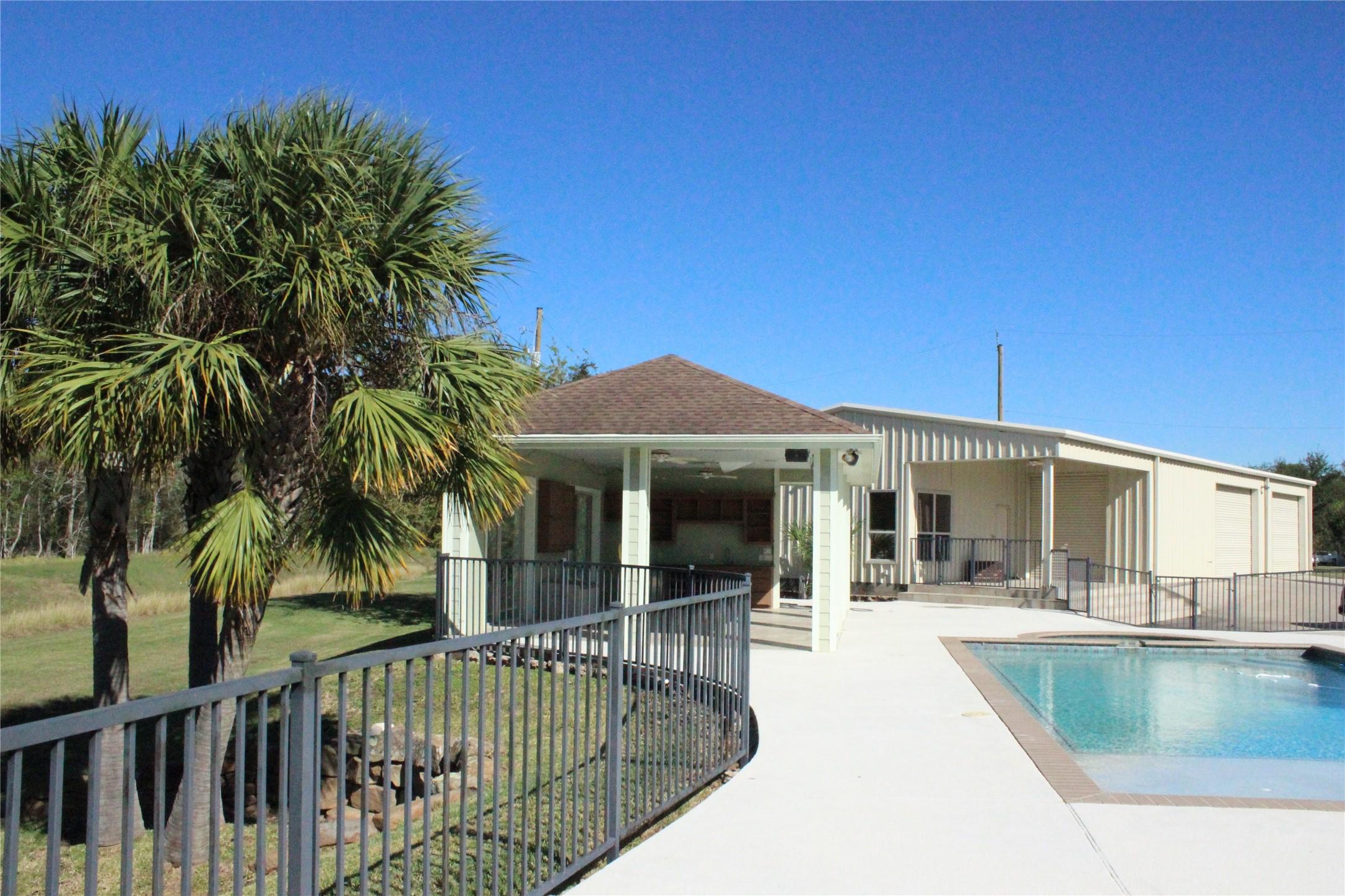 Image 2: Covered Patio Area & Barndominium