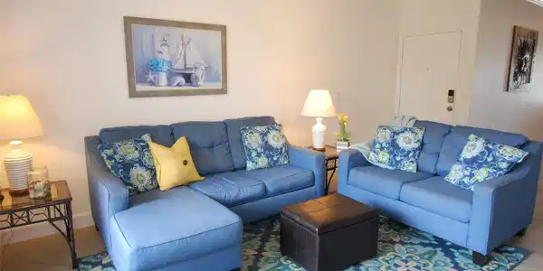 Image 4: Condo has tile floors throughout the living space