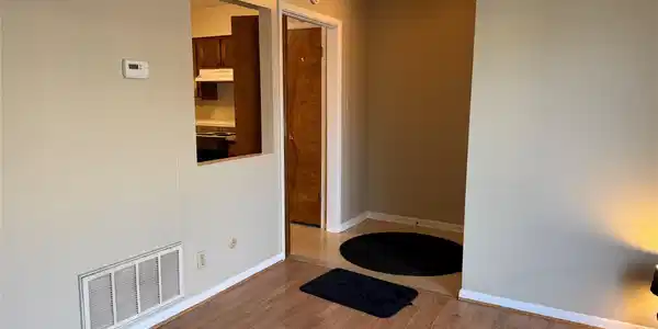 Image 2: Front Door, Entrance to Kitchen, from Livingroom