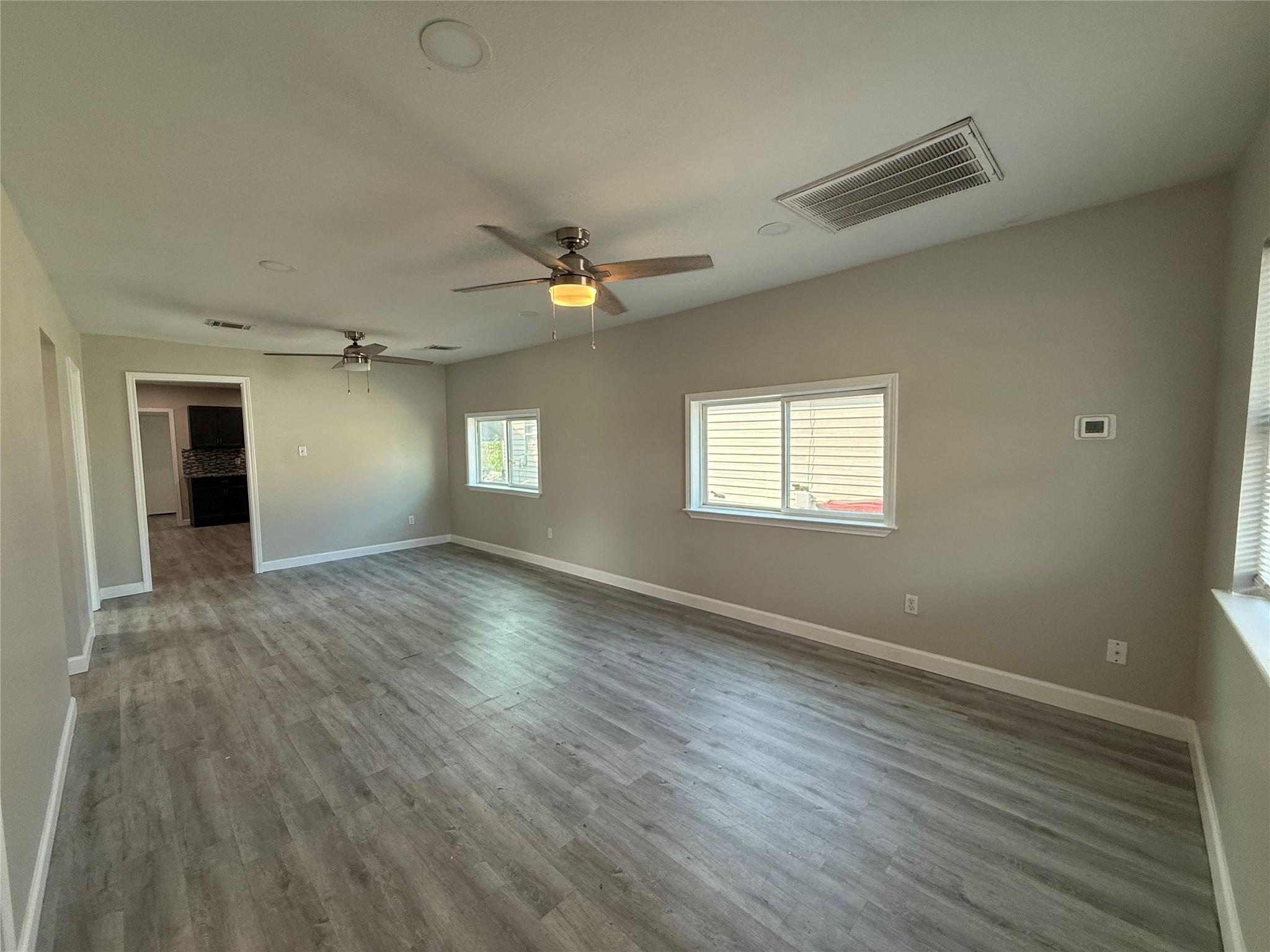 Image 3: Living Room/Dining Area