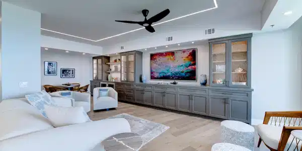 Image 4: Custom floor-to-ceiling cabinetry features softly
