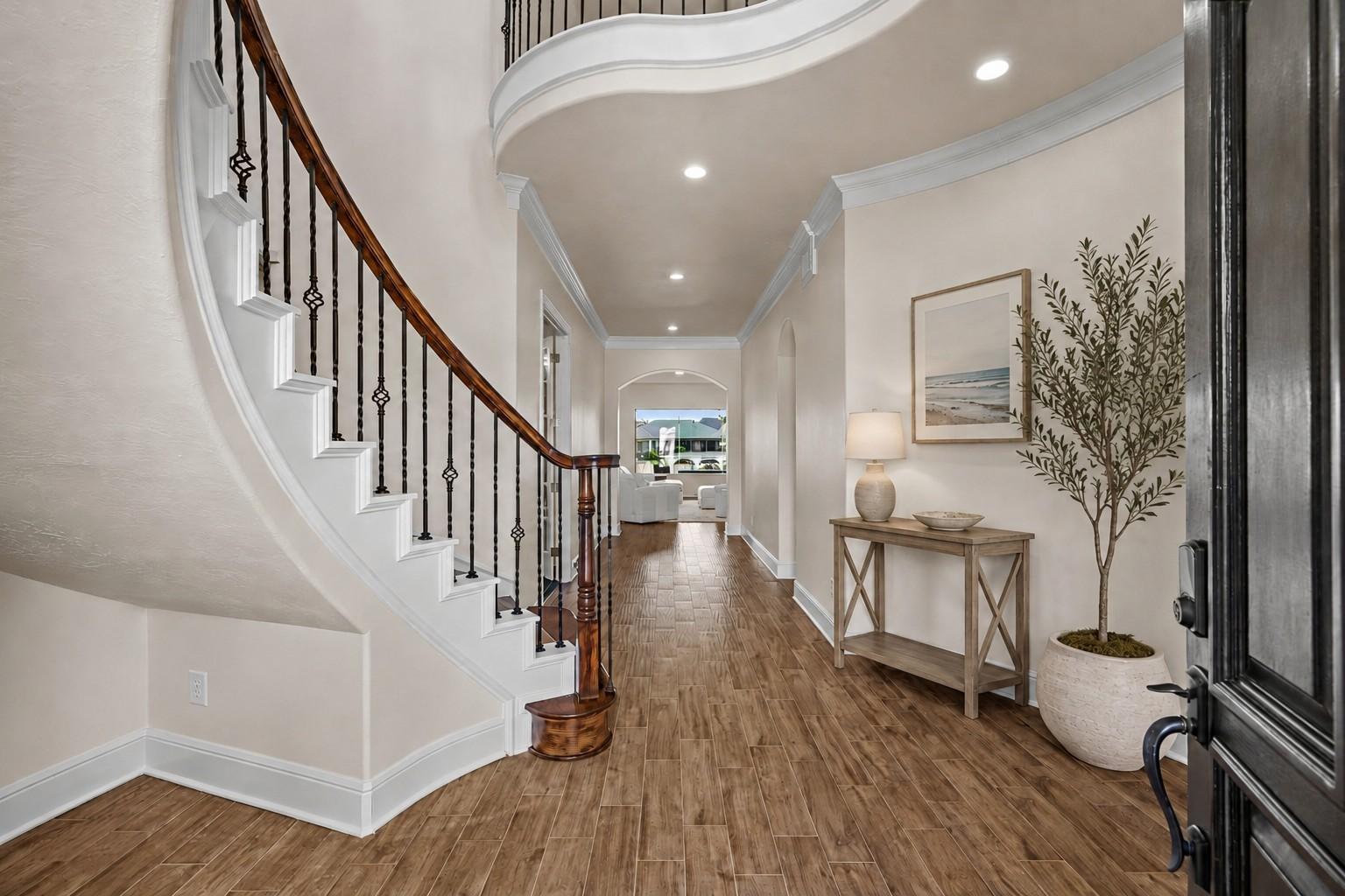 Image 3: Inviting formal entry way will WOW you!