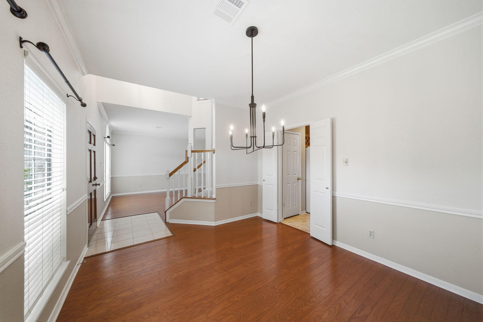 Image 4: Formal Dining room located at the front of the hom