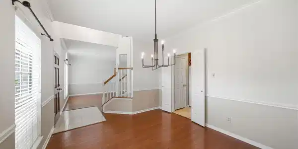 Image 4: Formal Dining room located at the front of the hom