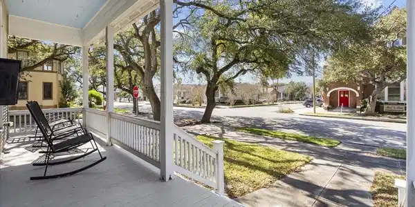 Image 2: Relax on the spacious front porch with your mornin