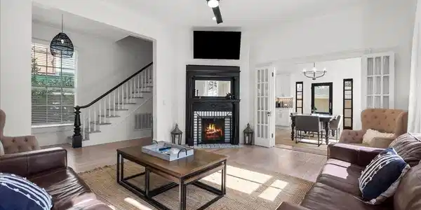 Image 4: Inside, high ceilings create a bright, airy feel t